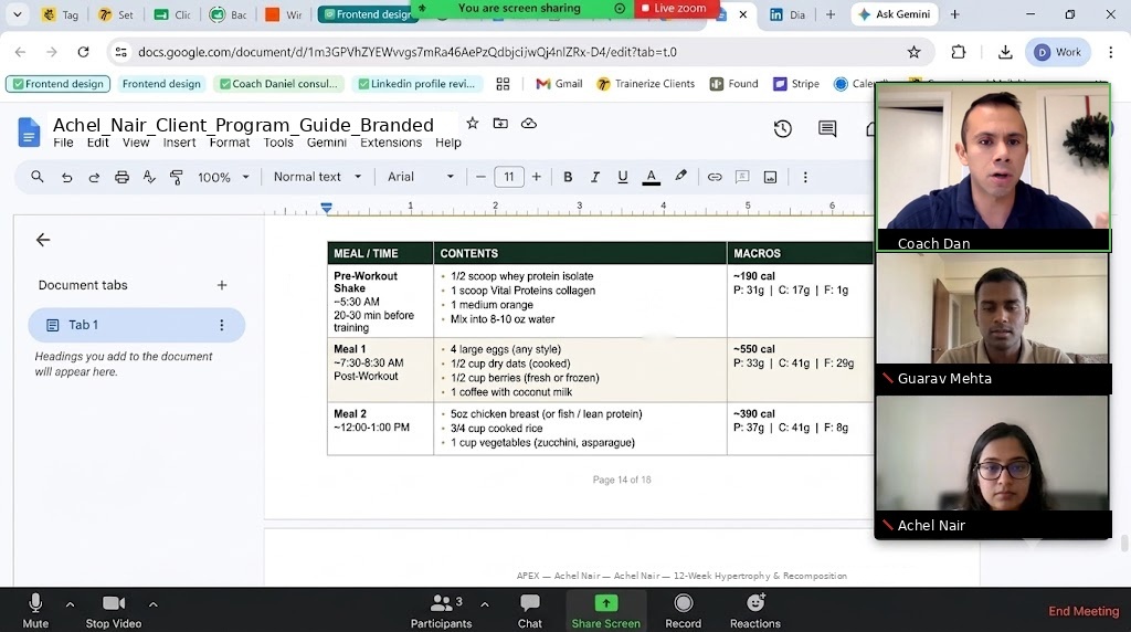 Coach Dan reviewing a client program guide on a live video call